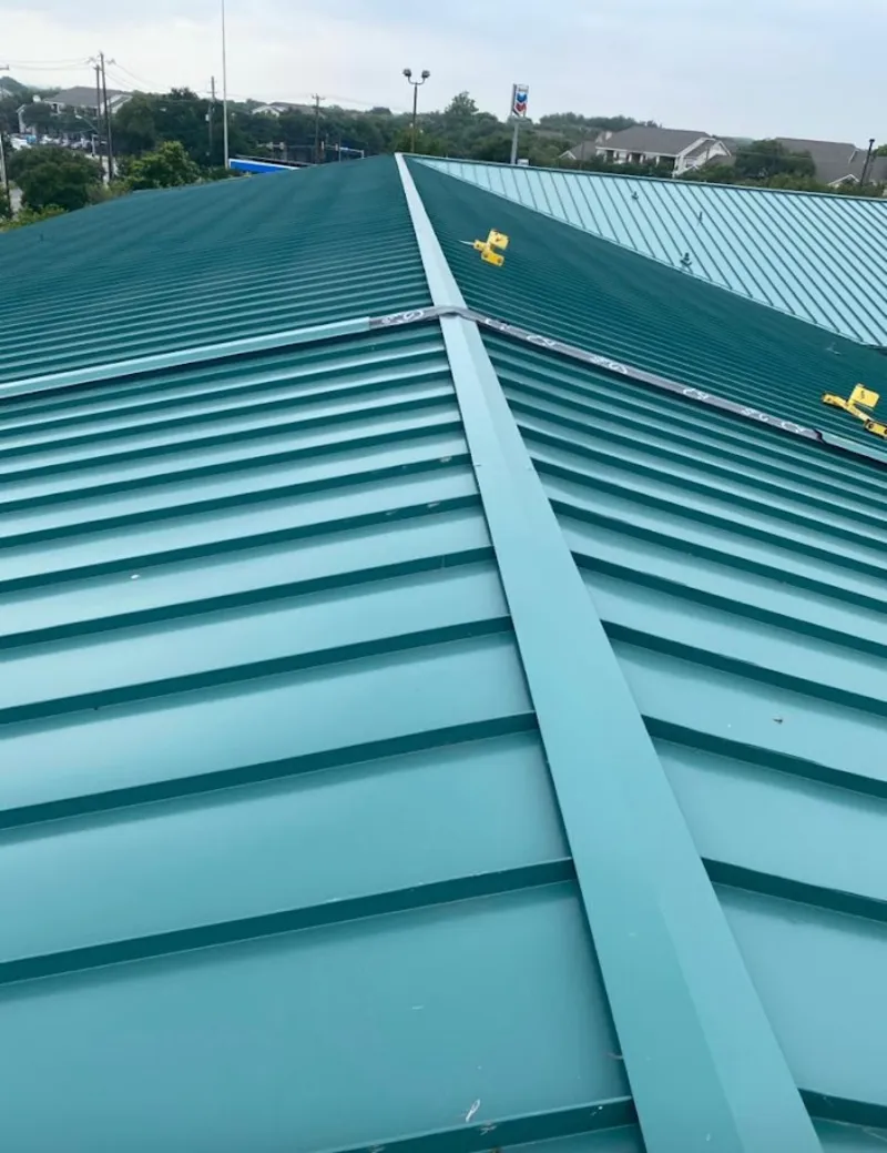 Green commercial metal roof ridge and valley for Metal Roof Repair in Lakemoor