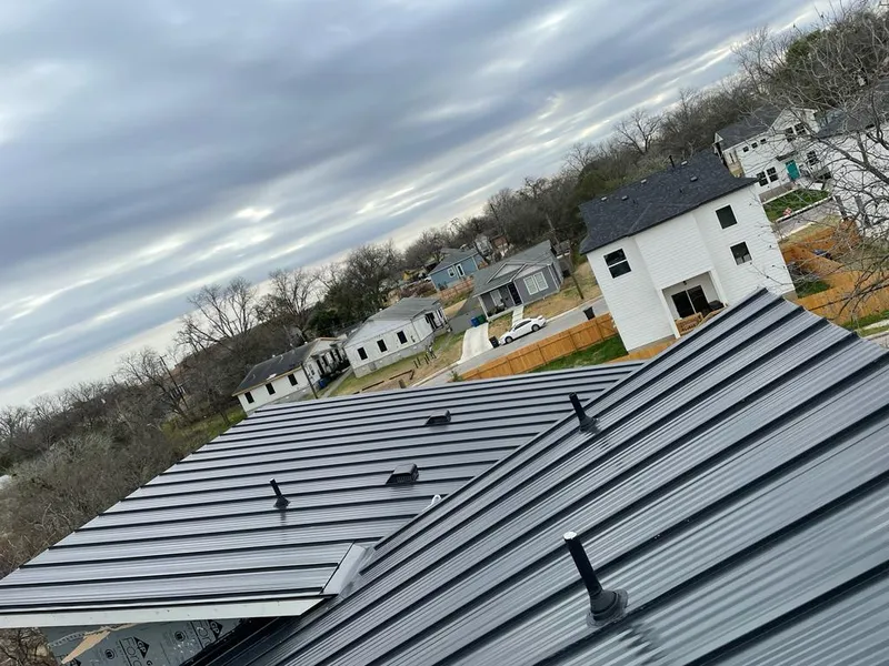 Standing seam metal roof panels with vents for Skylight Repair in Lakemoor